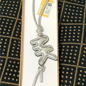 Michael Kors Metallic Silver Leather Logo Charm
